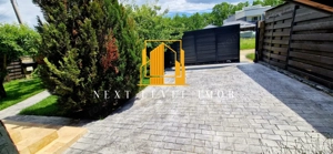 Casă de vis în inima Pădurii Trivale – tradiție, eleganță și natură pură - imagine 2