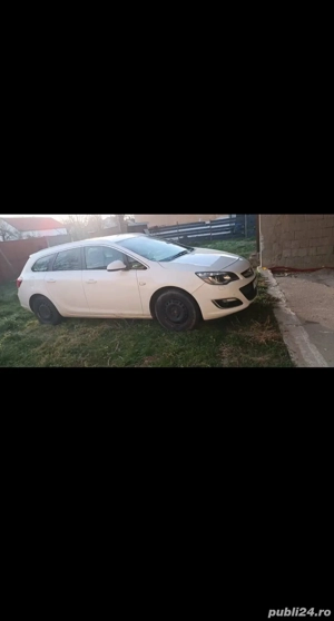 Vând Opel Astra J Sports Tourer  - imagine 2 Vând Opel Astra J Sports Tourer  - imagine 2