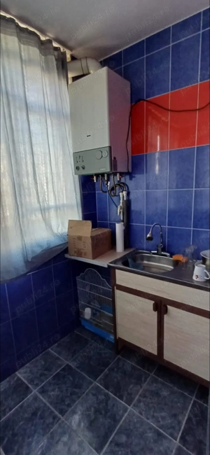 Vând apartament decomandat , cu două camere și două balcoane , la etaj 2  - imagine 7 Vând apartament decomandat , cu două camere și două balcoane , la etaj 2  - imagine 7