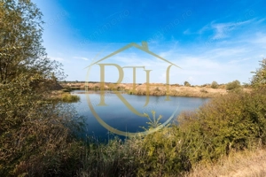 Investiție unică, 10 ha teren cu luciu de apă, ideal pentru turism și agrement!