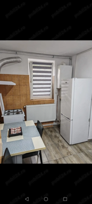 Închiriez în oraș Găești garsoniera 30mp, complet mobilata.