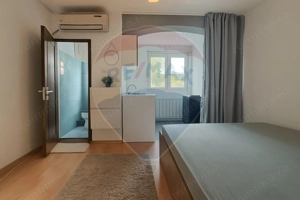 Garsonieră 15 mp utili + boxa 15 mp • mobilat • bloc cu lift • Titan