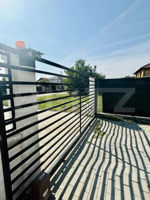 Vilă contemporană cu 5 dormitoare, 5 băi și teren de 920 mp - imagine 11