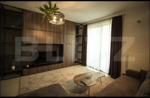 Apartament modern, zona centrala, cu parcare. Ocupabil de la 1 ianuarie  - imagine 7