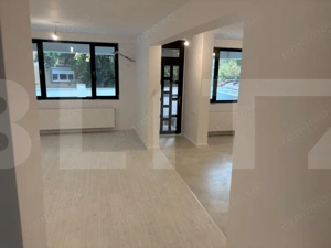 Apartament tip vilă, 4 camere, 3 niveluri, curte proprie 40 mp, intrare separa - imagine 3