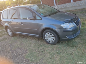 vand  vw turan  1.9 tdi an 2007 cu actele la zi