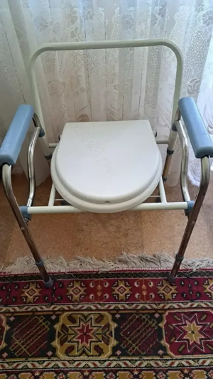 Vând scaun pe rotile cu WC