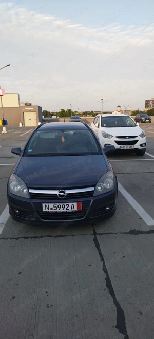 Vând Opel Astra Caravan 2006 1.6 benzină  - imagine 5