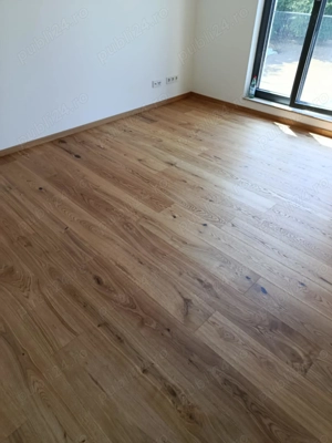 Ofer servicii de montaj parchet laminat si zugraveli interioare 