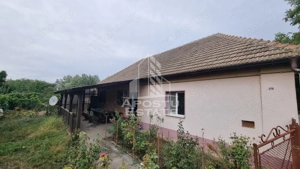 Casa individuala, curte generoasa, centrala proprie, sat Covaci