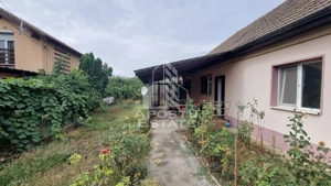 Casa individuala, curte generoasa, centrala proprie, sat Covaci - imagine 2 Casa individuala, curte generoasa, centrala proprie, sat Covaci - imagine 2