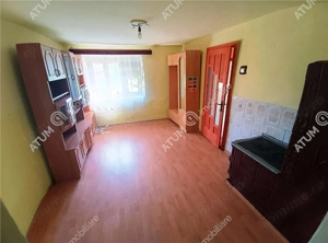 Casa cu 4 camere si 1650 mp teren la doar 30 km distanta de Sibiu - imagine 6