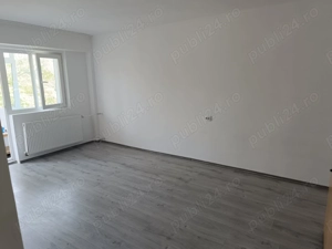 Închiriez apartament 2 camere, etaj 1, zonă centrală .