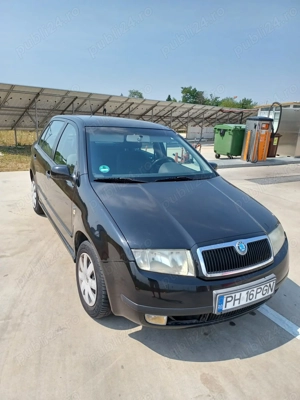 Vand sau dezmembrez scoda fabia an 2004