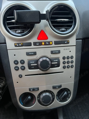 Opel Corsa 1.4 - imagine 6