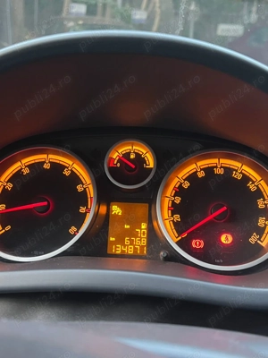 Opel Corsa 1.4 - imagine 11