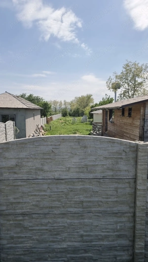 Teren cu 2 case in fata pontonului din Partizani jud Tulcea