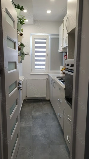 Închiriez apartament cu 2 camere - imagine 2