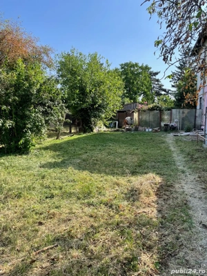 Vând apartament cu curte 