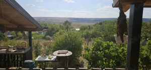 Casa 3 camere, bucatarie, baie, beci si teren 4600 mp, panouri solare, Mastacani - imagine 2