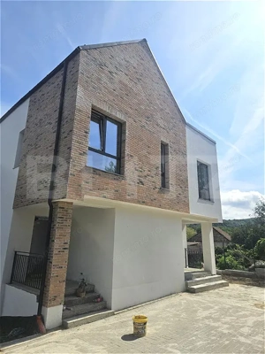 Casa cu 136 mp utili, mansarda amenajabila si intimitate într-un ansamblu privat