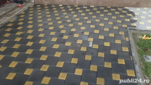  Montaj pavele curți, parcări, trotuare, alei, garaje, construcții