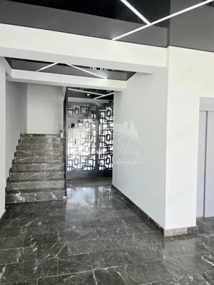 Apartament modern cu balcon generos și acces la piscină - imagine 18