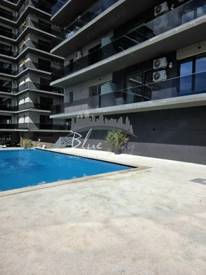 Apartament modern cu balcon generos și acces la piscină - imagine 9