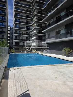 Apartament modern cu balcon generos și acces la piscină - imagine 20
