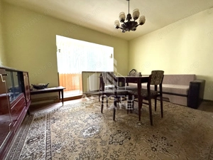 Apartament cu 3 camere, etaj 1, centrala proprie,garaj, zona Girocului