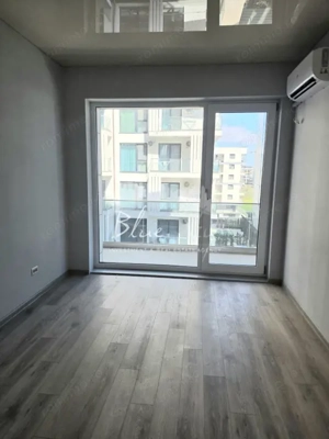 Apartament modern cu balcon generos și acces la piscină - imagine 4
