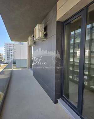 Apartament modern cu balcon generos și acces la piscină - imagine 12