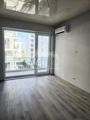 Apartament modern cu balcon generos și acces la piscină - imagine 7