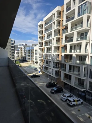 Apartament modern cu balcon generos și acces la piscină - imagine 10