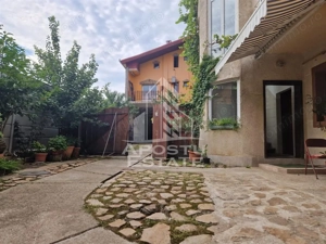 Casa familiala cu spatiu comercial si garaj P+1E+M 720 Mp - imagine 20