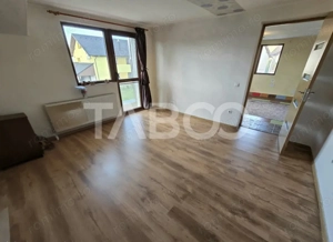 Casa de vanzare cu 6 camere 2 parcari curte libera 200 mp in Selimbar - imagine 12