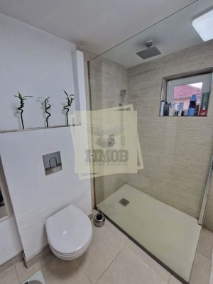 Apartament modern pe 2 niveluri 4 camere 2 bai si 82.4 mpu in Sibiu - imagine 4