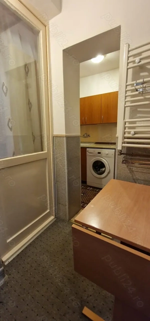 Dau în chirie apartament cu una camera - imagine 6