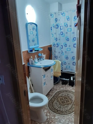 Vând ap.4 in Adjud ,BN. cam.2 bai 2 balcoane 2 ,3 3 cu acoperiș ,pod închis și boxa subsol.. - imagine 2