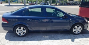 Opel astra h berlină 1.6 benzină an 2011