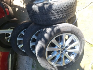 Genti mazda plus anvelope mixte