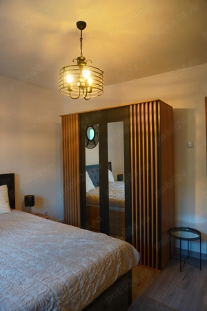 Închiriez apartament 3 camere - imagine 4 Închiriez apartament 3 camere - imagine 4