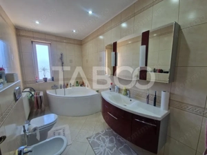 Casa individuala teren 979 mp gradina curte si terasa de vara Rasinari - imagine 7