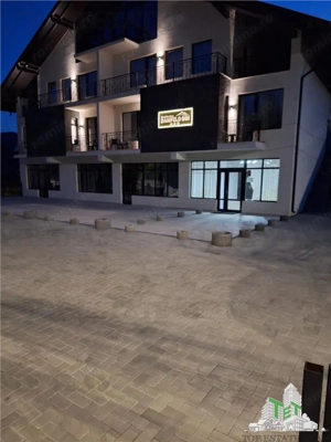 Pensiune premium de vanzare in Voronet – 1.610 mp utili, teren 1.021 mp, afacere turistica activa - imagine 2