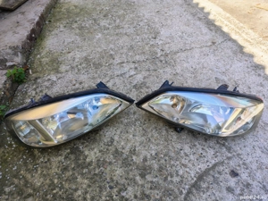 Faruri Opel Astra G - sticle recondiționate - cleme rupte