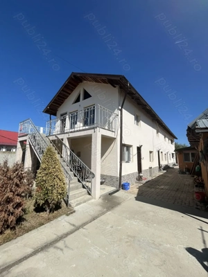 COMISION 0 Casa P+1 2 intrari 7 camere 4 bai teren total 861 mp Poroinica