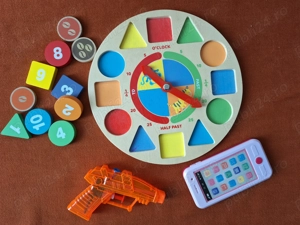 Jucarii pentru copii (ceas din lemn, telefon cu melodii, pistol apa)