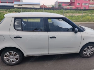 Skoda Fabia 2013, 1.2, benzina, imbunatatiri, 207000 km, navigatie, camera mansalier 3600 Eur - imagine 3 Skoda Fabia 2013, 1.2, benzina, imbunatatiri, 207000 km, navigatie, camera mansalier 3600 Eur - imagine 3
