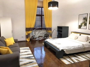 Apartament cu finisaje clasice in zona centrala - imagine 2