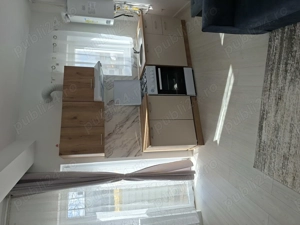 Închiriez garsoniera tip studiou cu curte si parcare